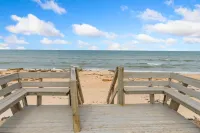 Tropical Elegance Meets Coastal Adventure at This Stunning Oceanfront Retreat!