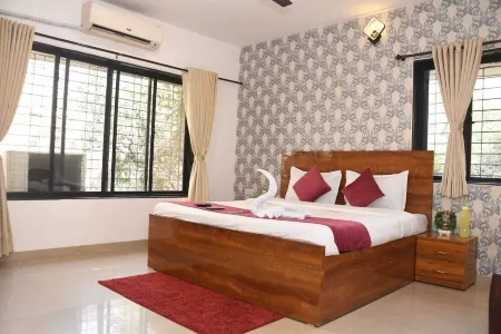 Tulsi Home Stay Отели рядом с достопримечательностью «Пляж Марве»