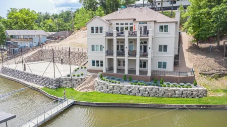 Luxury Lakefront Dream Home w/ Boat Dock and Volleyball Court!