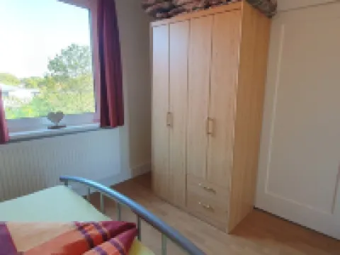 Cozy apartment centrally located with separate entrance and parking. Hotels in Jever