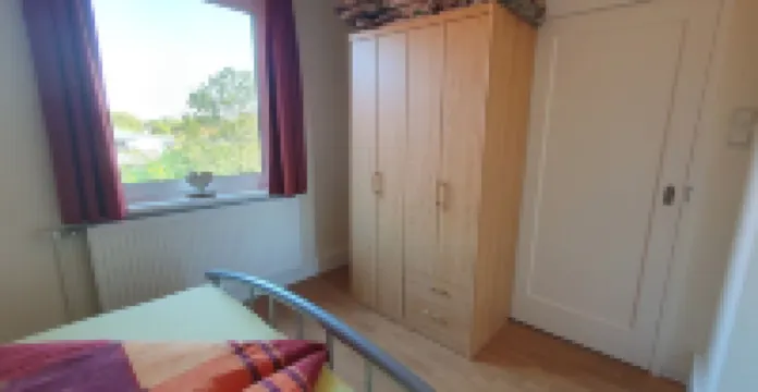 Cozy apartment centrally located with separate entrance and parking.