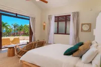 Beach Villa specializing in weddings, milestone & corporate events. Hoteles en 