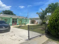 2 minute walk to beautiful beach and great food! Relaxing beach house with pool! Hotels near Little Jim Bridge Park