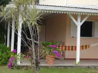 F2 Bottom corner villa with veranda and trees Hotels in 