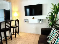 Comfortable modern apartment conveniently located for shopping and dining.