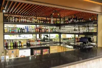 Qs Evander Hotel and Apartments - バー