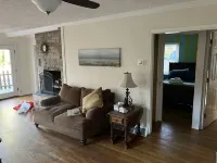 Cozy Cottage with access to and partially obstructed views of the bay.