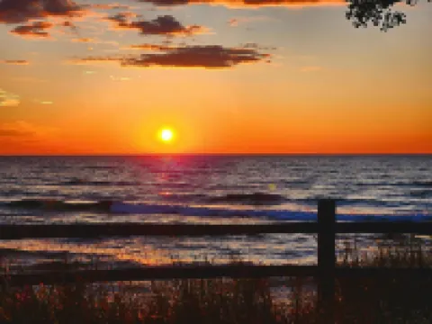 Newly built 4-bedroom cottage w/ WiFi & AC next to dunes, Lake Michigan & beach