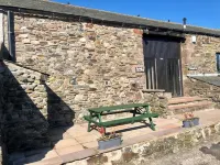 Rustic barn Cottage in a rural village with traditional open fireplace sleeps 5.