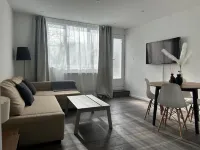 Cosy apartment 5 minutes from downtown Отели в г. 