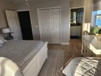 Large home on private penninsula with waterfront and views on three sides.