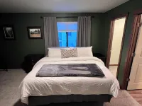 The place to stay: pool table, king bed.