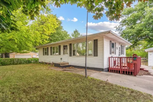 Welcoming 2-bedroom home with large deck and central location.