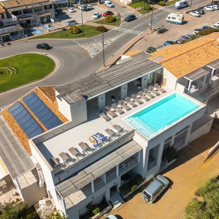 Felix Hotels - Hotel Residence Porto San Paolo Отели рядом с достопримечательностью «Пляж Лу-Импосту»