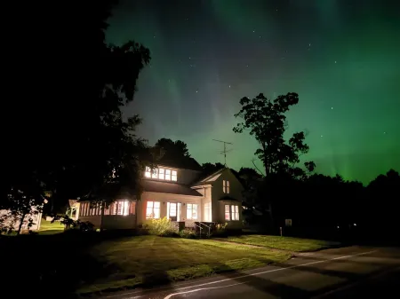 Spacious 5-bedroom farmhouse in lovely Omena, MI with AC, WiFi & lake views