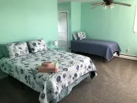 Beach Front on the Bay in Our Rustic, Pet Friendly Cottage 4 Bedroom Cottage by RedAwning - balcony