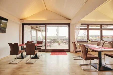 Hotel Parc Fermé Отели рядом с достопримечательностью «Cono's Paradise»