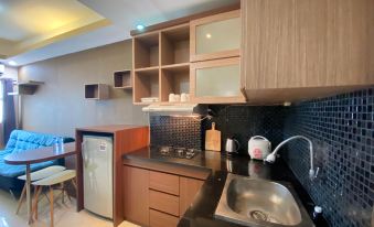 Well Furnished 2Br at Suites @Metro Apartment