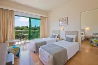 Natura Beach Hotel and Villas Hotels near Latchi playground