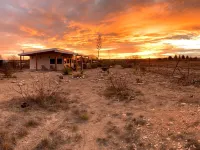 Sunset Ranch, a private acre lot facing open ranch land and high planes desert