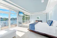 VIP Luxury 5 BR OceanFront Villa | Heated Pool & Dock | Free Parking & WiFi