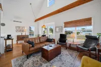 Relax and unwind in a tranquil space one block from the beach