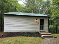 Trophy Buck sleeps 6, or rent all 4 for 20. Horseback riding across the Rd!