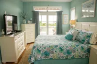 Beachside Bliss!  Ocean views, beautiful pool and a 2 minute walk to the beach!