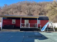 River Road Retreat.  Cabin minutes away from trails w/ hottub & seasonal pool! Hotels in Pike County