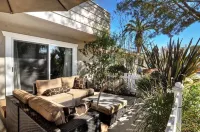 Kick back on Large Patio Close Beach & Village Garage
