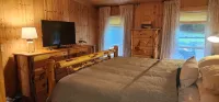 A cozy, pristine family retreat located in the town of Inlet.