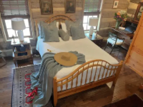 Historic Log Cabin fully restored; gourmet kitchen & much more!