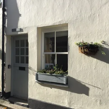 HOWTON COTTAGE - village cottage on coast path next to beaches