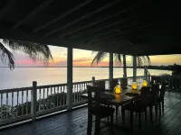 Oceanfront Gated Corner lot Amazing Sunsets. 90” BoatDock & 12 person Swim Spa!