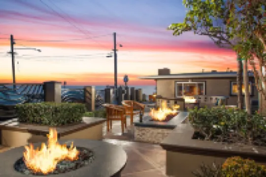 A Few Steps to the Beach! Ocean Views, Patio and 1 Car Garage Parking!