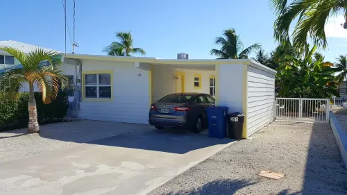 Dog-Friendly Waterfront House with 37ft Dock and Cabana Beach Club & Pool