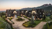 Apartamenty Sun & Snow Szymoszkowa Residence z Basenem فنادق في Koscielisko