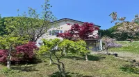 Yellow House by Lake Toya