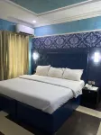 Trinich Suite Hotels near Adedayo Shopping Complex