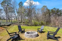 Cozy Backyard with Fire Pit and Modern Amenities - Charming Hideaway Hotels near Union Baptist Church