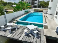 See Belize Waterside Sea View 2-Bedroom Apt for 6 w Balcony, Pool & Deck, 2nd FL