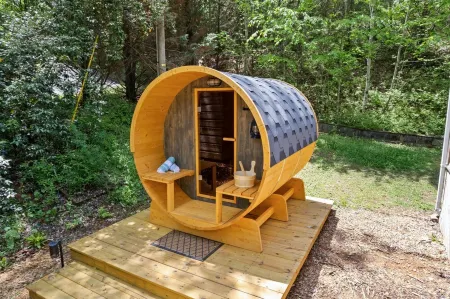 Cozy Creekside Cabin w Barrel Sauna, Covered Wraparound Deck - Pet Friendly!