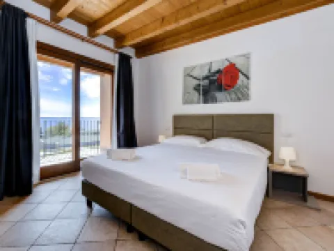 レジデンス ルレ ローザ デイ ヴェンティ モニーガ・デル・ガルダのホテル