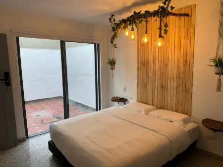 Rustik House Отели рядом с достопримечательностью «Plaza de Toros La Macarena»