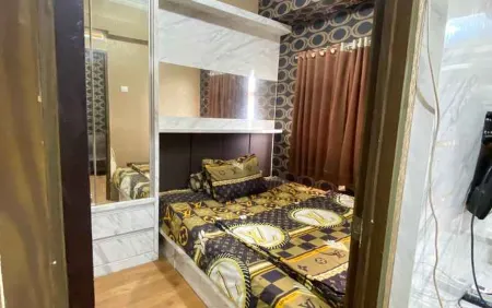 Apartment Studio The Suites Metro by Rusdi Kingpro Отели в г. Buahbatu