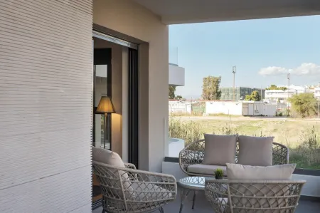 Glyfada Experience Residence Отели в г. Глифада