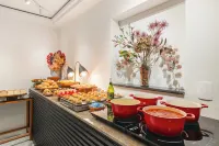 聖保羅伊比拉普埃拉斯拉維耶羅飯店式公寓 - 早餐