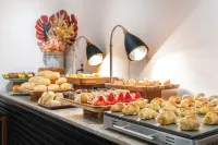 聖保羅伊比拉普埃拉斯拉維耶羅飯店式公寓 - 早餐