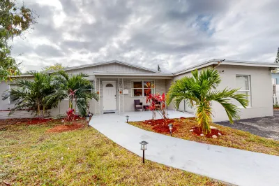 Breezy dog-friendly home near Deerfield Beach with private pool, lawn, fast WiFi Hotels near 7-Eleven