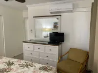 Discounted! Partial ocean view condo with pool & just steps to beach.